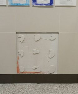 Damaged tile that was spot bonded