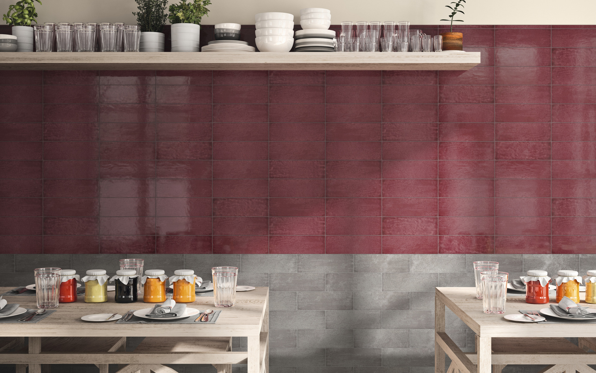 Wall tiles in restaurant in color block sections, grey and burgundy.