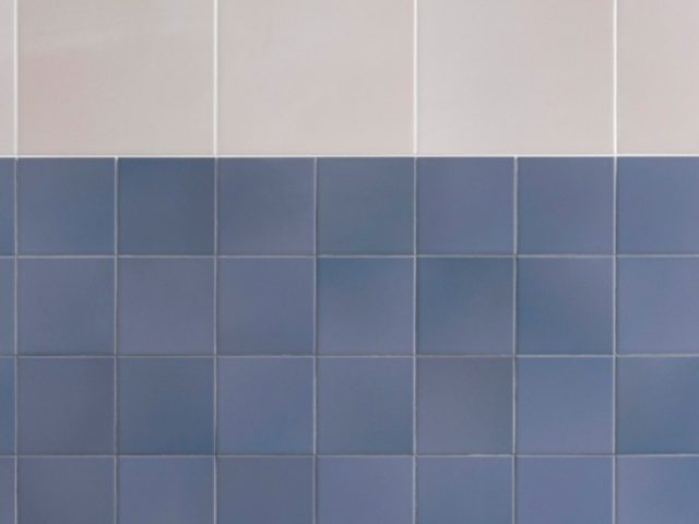 blue and white square tiled wall
