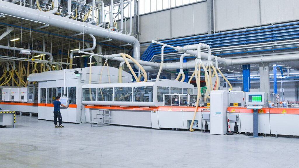 The continua line press from Sacmi used in manufacturing.